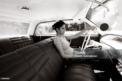 Young Woman Driving Vintage Car Stock Photo - Download Image Now - iStock