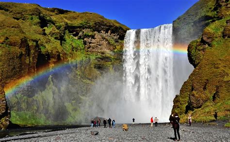 Skógafoss Waterfalls below the Eyjafjöll mountains and west of ...