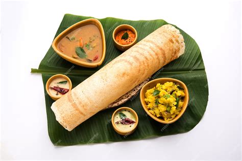 Premium Photo | Masala dosa is a South Indian meal served with sambhar ...