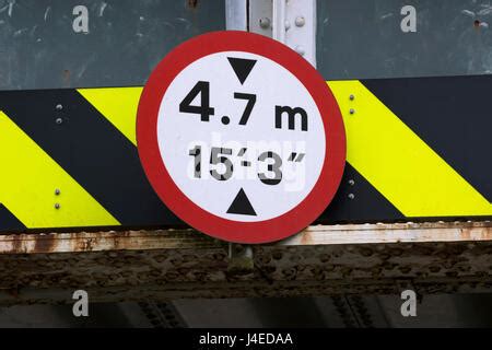 UK bridge clearance height warning sign. Low bridge concept, red ...