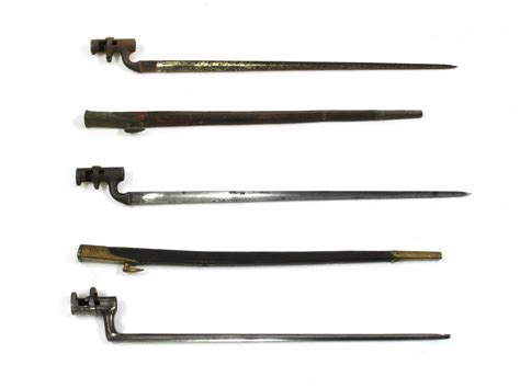 Lot 803 - Two Martini Henry rifle bayonets with