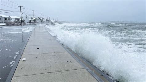 Winter storm flooding at high tide at Long Sands Beach in York, Maine