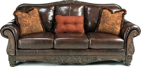 Delightful brown leather sofa with wood trim Images, best of brown ...