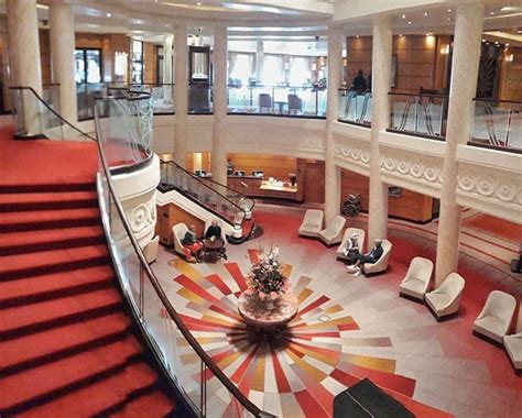 #cruise #photooftheday The gorgeous Grand Lobby on Queen Mary 2 looking ...