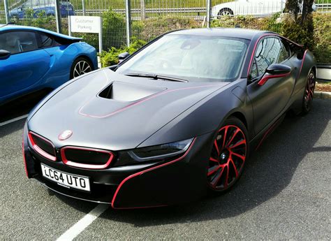 BMW i8 satin black wrap with red highlights