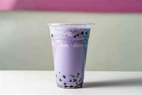 Taro milk tea combines the starchy root taro or taro powder with ...