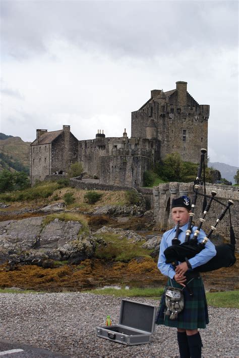 bagpipes at eilean donan castle in inverness-shire, scotland Idyllic ...