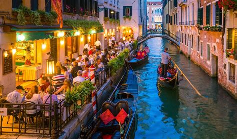 Canal in Venice Italy at night - New Horizons Travel