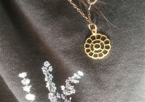 Help identifying this symbol on my necklace? (Inherited from my indian ...