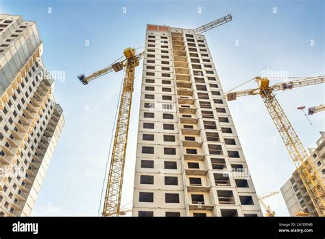 Construction site with cranes Stock Photo - Alamy