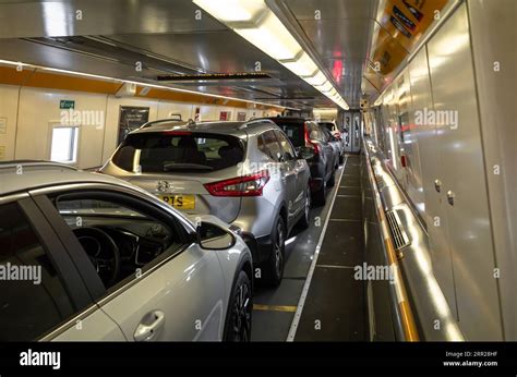 Passengers cars loaded onto the Eurotunnel train known as Le Shuttle ...