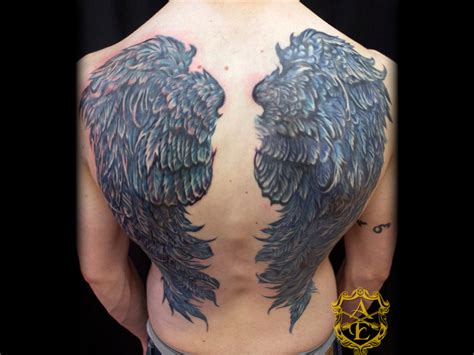 Arrows And Embers Custom Tattooing: Raven Wings Back Tattoo done by ...