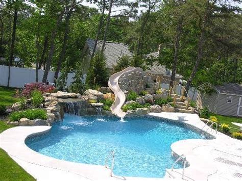 Swimming pool designs with slides | Hawk Haven