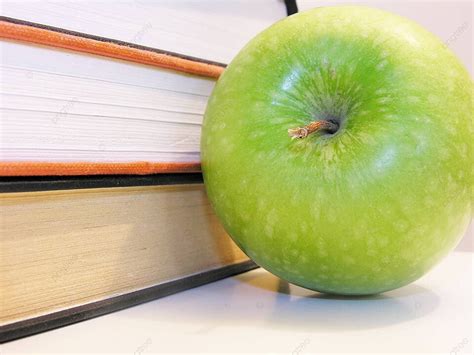 Green Apple With Books Education Pages Educate Photo Background And ...