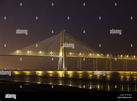 Vasco da Gama bridge illuminated at night, Lisbon Portugal Stock Photo ...