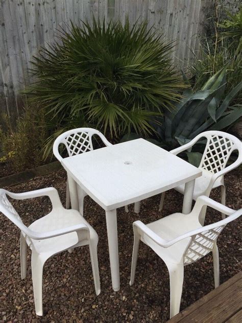 Garden plastic white table & 4 stackable chairs | in Torquay, Devon ...