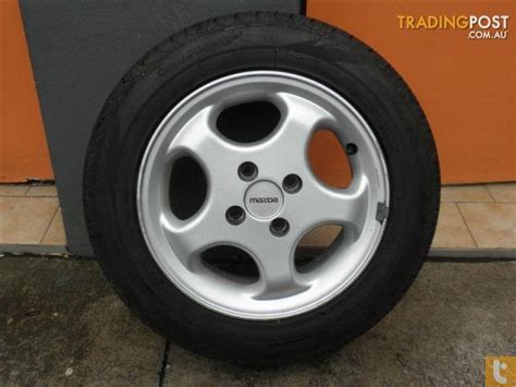 MAZDA 323 14 INCH GENUINE ALLOY WHEELS