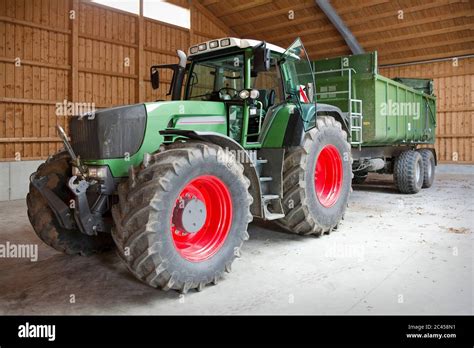 Tractor in the barn Stock Photo - Alamy