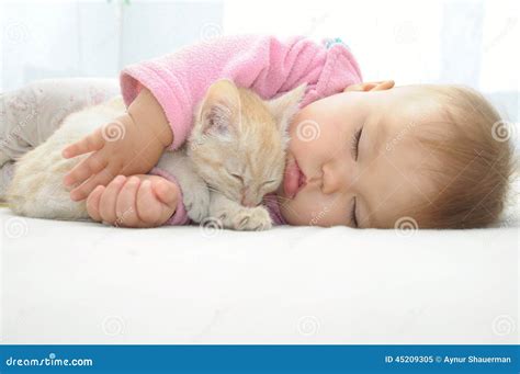 Baby and Cat Sleeping Together Stock Image - Image of cute, baby: 45209305