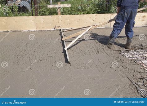 Worker Leveling Fresh Concrete Slab with Special Working Tool Stock ...