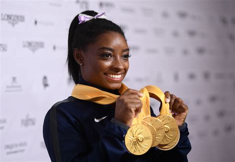 Gymnast Simone Biles Flaunts Her Enviable Figure in Red Swimsuit by the ...