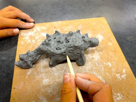 Zilker Elementary Art Class: 1st Grade Clay Dinosaur Sculptures