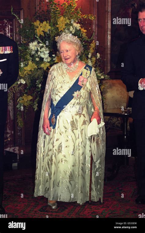 The Queen Mother, wearing a tiara, attending the opening ceremony of ...