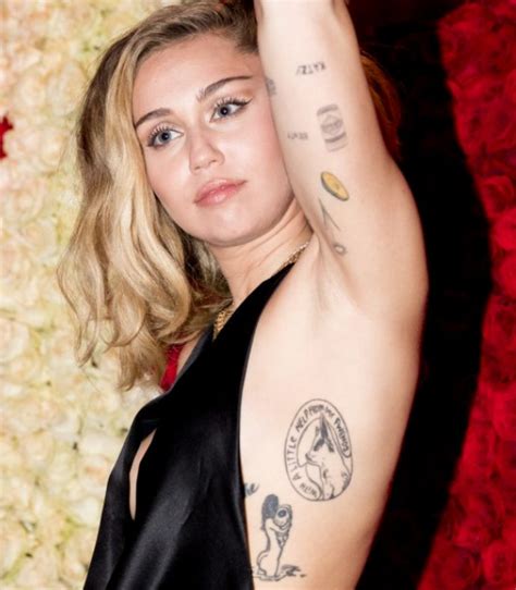 Miley Cyrus Upper Arm Tattoo