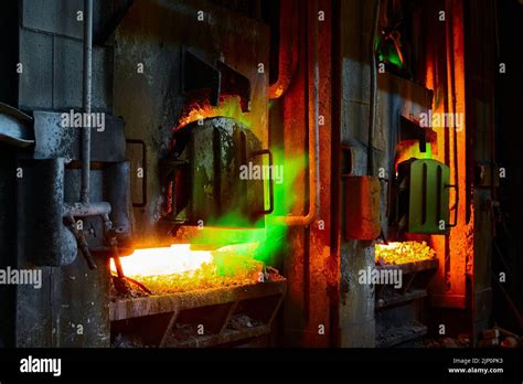 Reverberatory furnace melts copper metal with burning flame Stock Photo ...