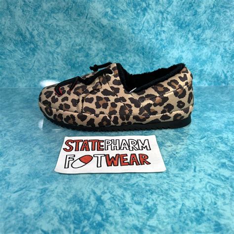 Brand new Champion Slippers 'Animal Print'. Size 6... - Depop