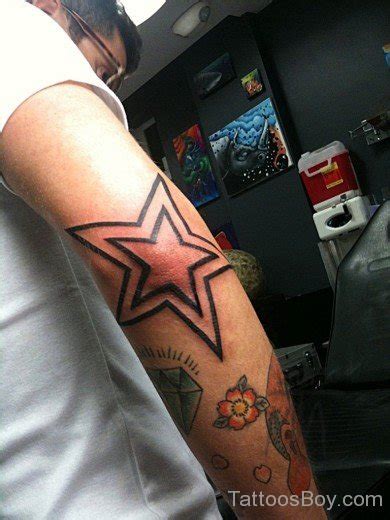 Black Star Tattoo Design | Tattoo Designs, Tattoo Pictures