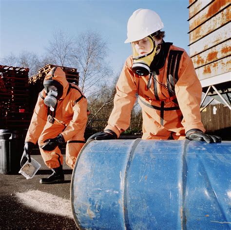 Workers Cleaning Up A Chemical Spill Photograph by Tek Image