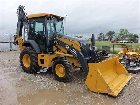 Had to go thru mud to get this 410K tractor loader backhoe.John Deere ...