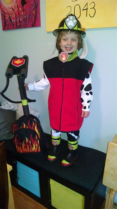 Marshall from paw patrol costume. Back pack from walmart, hose from ...