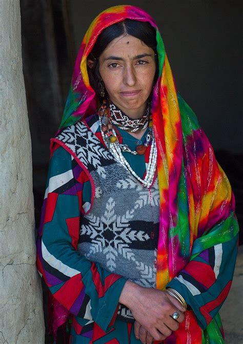 Portrait of an afghan woman in traditional clothing from pamir area ...