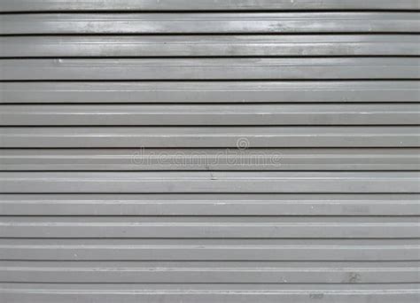 Perforated Metal Garage Door Texture Background. Copy Space Stock Photo ...