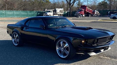 Drive Off In This 1969 Ford Mustang SportsRoof Coupe Restomod