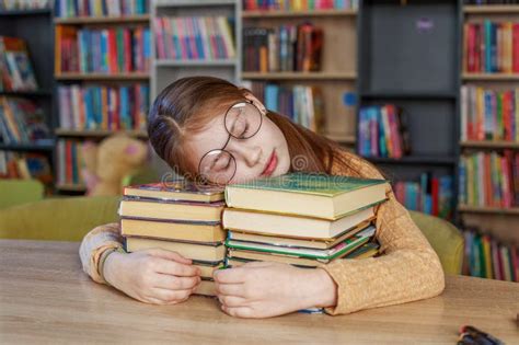 Tired Child Sleeping while Studying. Bookstore Concept, Education and ...