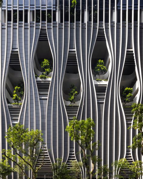 BIG completes a planted tower in Singapore with a facade that pulls apart