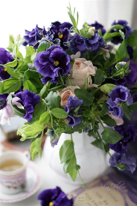 Pansy Centerpiece | Flower arrangements, Pansies, Spring arrangements