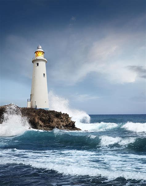 White Lighthouse On The Cliff Photograph by Narvikk