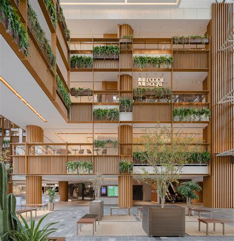 AIM Architecture redesigns shopping mall's atrium with suspended plants ...