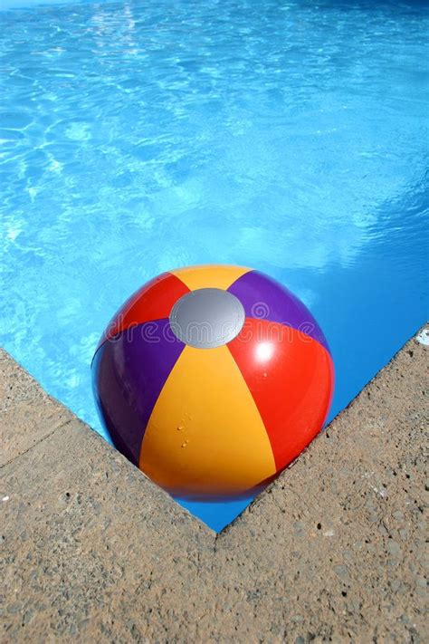 Fun and Colorful Beach Ball in a Pool