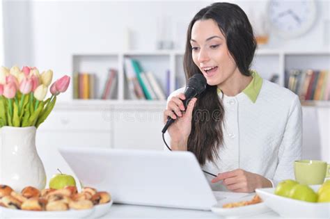 Woman singing karaoke stock image. Image of device, cyberspace - 102619613