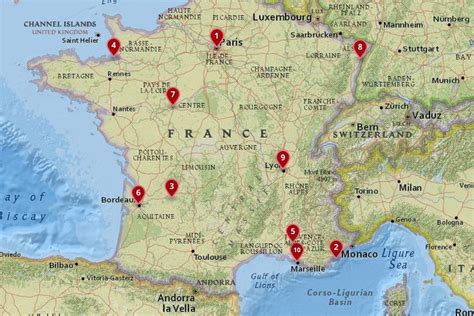 a map with red pins pointing to different locations in france ...