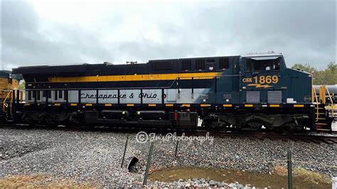 Heritage Unit CSX 1869 Chesapeake & Ohio leading CSX 102, 806, 973 ...