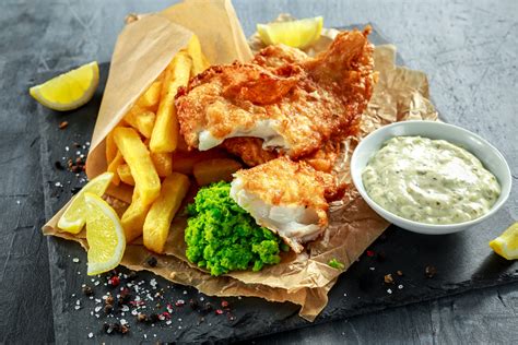 Arctic Royal Battered Cod with homemade chips, tartar sauce and mushy ...