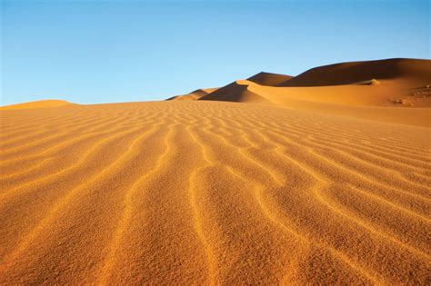 TIL "An unusual phenomenon associated with desert sands is their ...