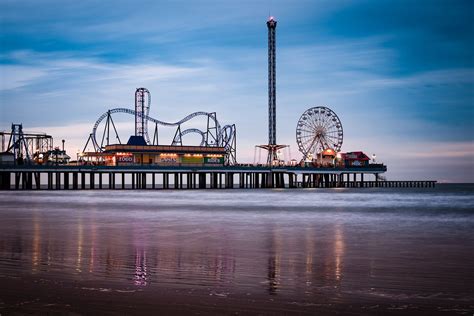 Daybreak at the Galveston Island Historic Pleasure Pier. See more # ...