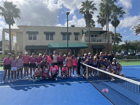 Chris Evert poses for a picture with 'happy' students from her tennis ...